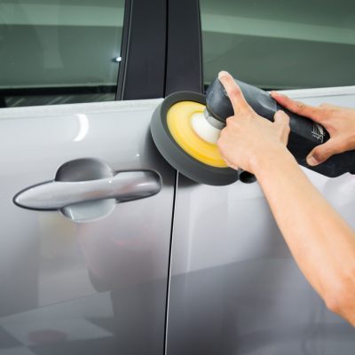 Detail: Polishing the car, preparing the car surface before coating the ceramics.